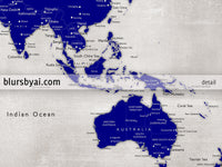 Custom map print: world map with cities in navy blue and distressed grey. "Delaney"